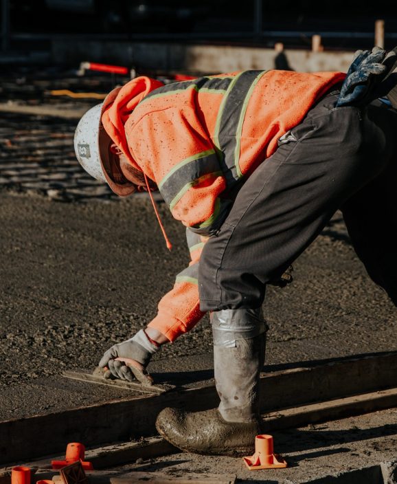 The workers in the construction site