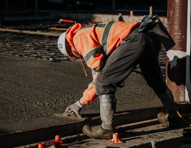 The workers in the construction site